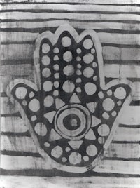 a black and white print of a hamsa hand